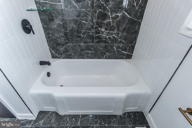 bathroom featuring marble finish floor