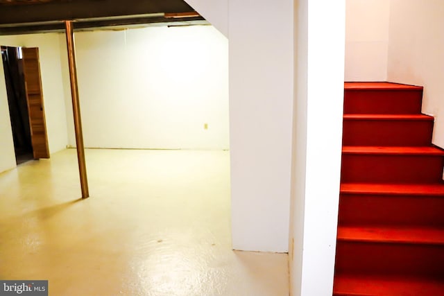 basement featuring stairway