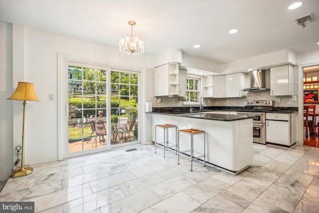 kitchen featuring open shelves, visible vents, marble finish floor, double oven range, and wall chimney exhaust hood