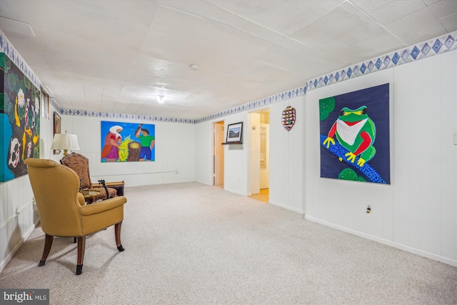 living area featuring carpet floors