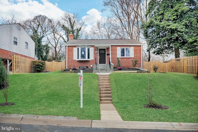 bungalow-style home with a front yard, fence, brick siding, and a chimney