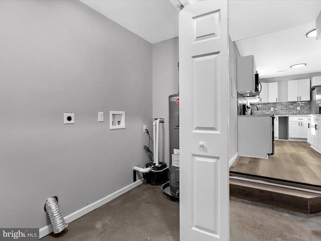 laundry area with laundry area, baseboards, electric water heater, washer hookup, and electric dryer hookup