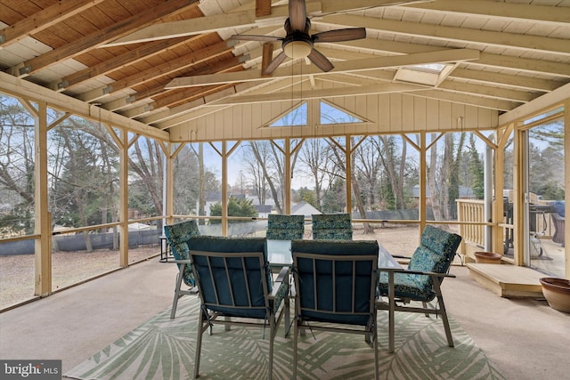 sunroom with wooden ceiling, vaulted ceiling, and a ceiling fan