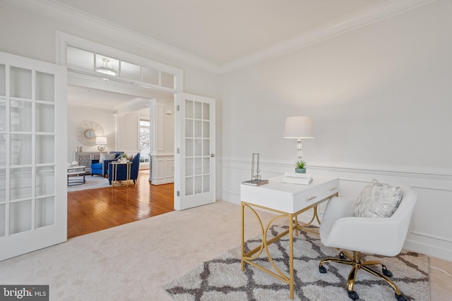 home office featuring decorative columns, ornamental molding, carpet flooring, wainscoting, and french doors