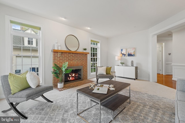carpeted living room with a fireplace