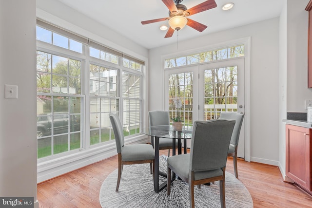 sunroom featuring french doors