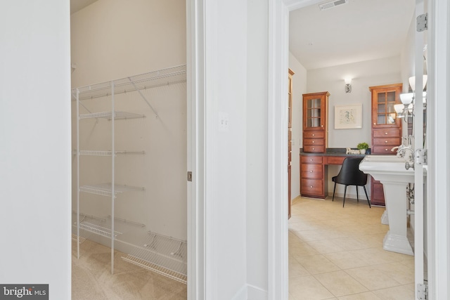 bathroom featuring tile patterned floors and visible vents