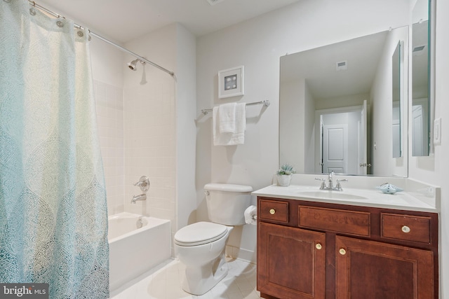 bathroom with visible vents, baseboards, toilet, vanity, and tile patterned flooring