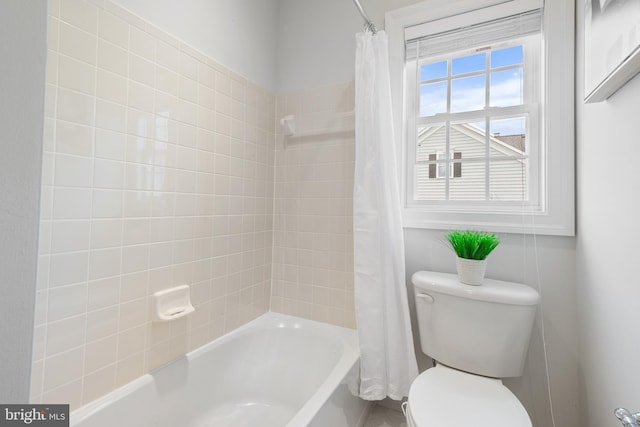full bath with toilet and shower / bath combination with curtain