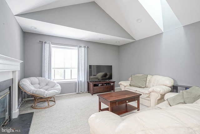 carpeted living area featuring a fireplace with flush hearth, recessed lighting, and lofted ceiling