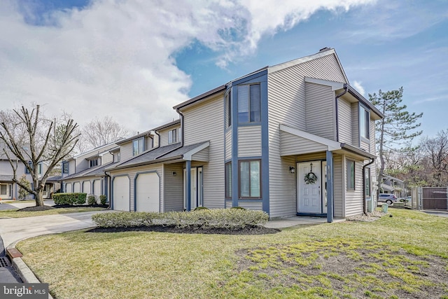 view of property with a garage, a residential view, concrete driveway, and a front lawn