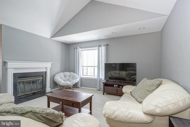 living area with a fireplace with flush hearth, lofted ceiling, recessed lighting, carpet flooring, and baseboards