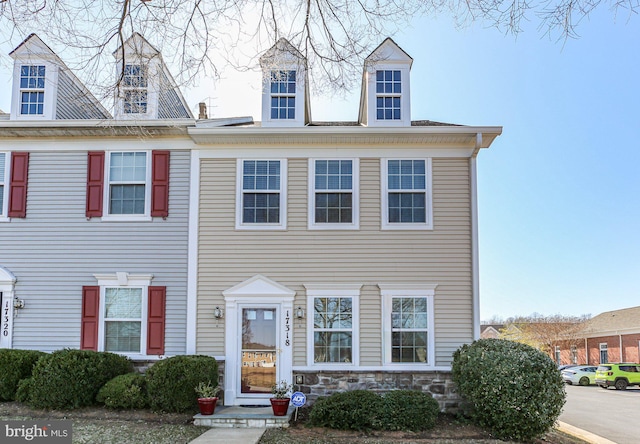 view of front of property featuring stone siding