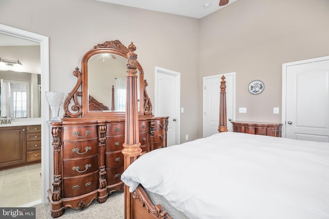 bedroom featuring light colored carpet