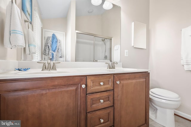 full bathroom with vaulted ceiling, double vanity, a stall shower, and a sink