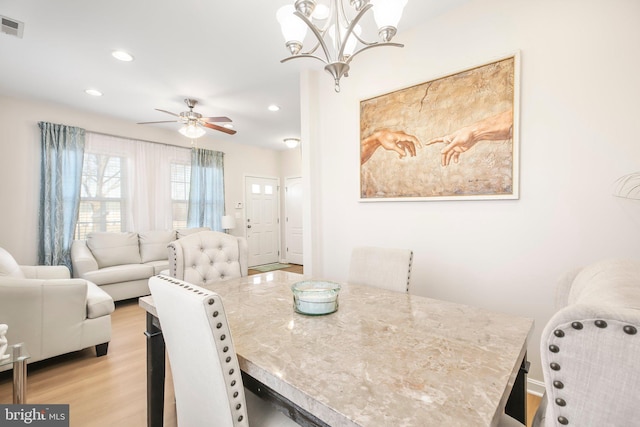 dining space featuring recessed lighting, visible vents, ceiling fan, and light wood finished floors