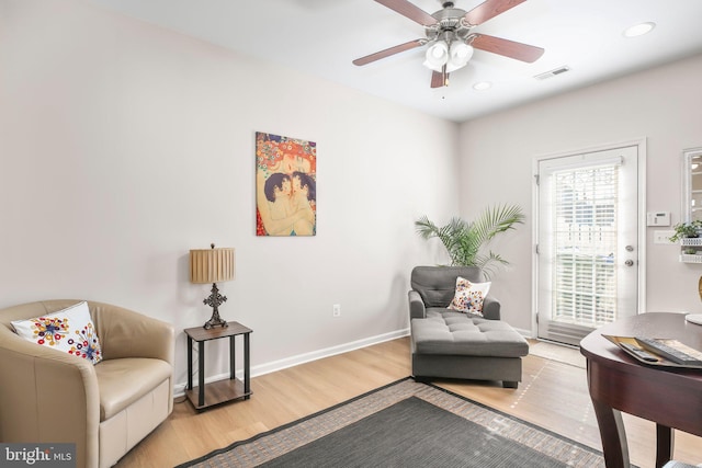 sitting room featuring visible vents, a ceiling fan, wood finished floors, recessed lighting, and baseboards