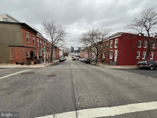 view of road featuring sidewalks and curbs