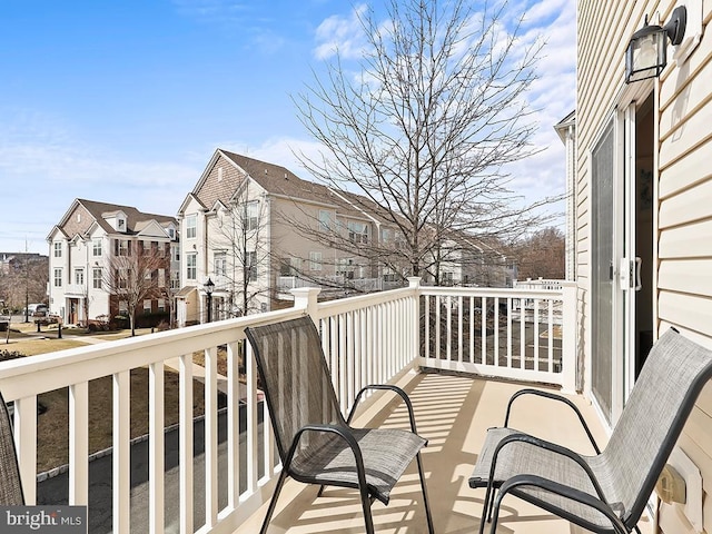 balcony featuring a residential view