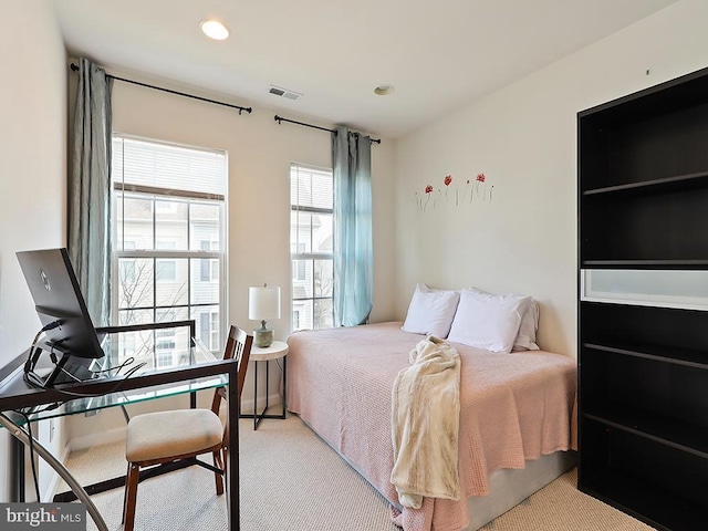 bedroom with light carpet, baseboards, visible vents, and recessed lighting