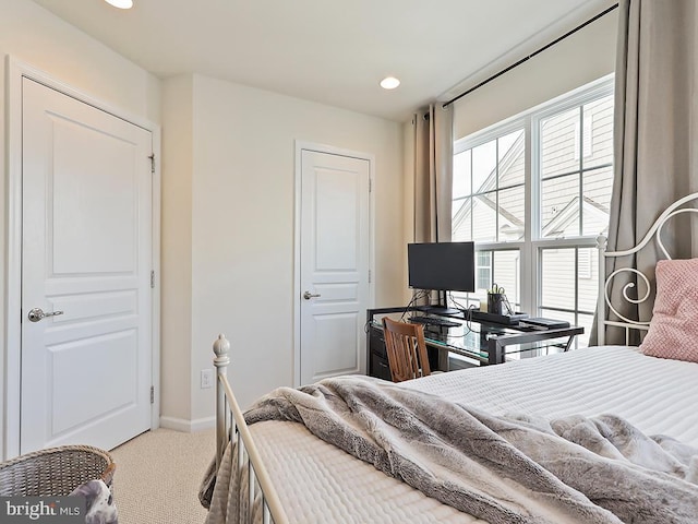 bedroom featuring carpet, baseboards, and recessed lighting