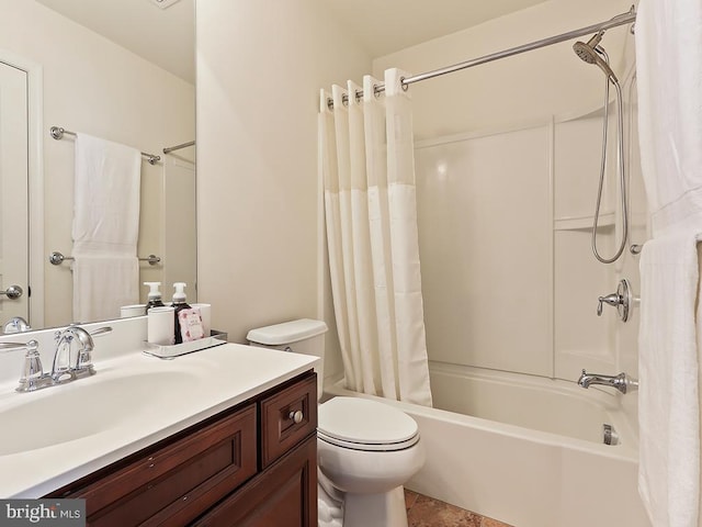 full bathroom with shower / tub combo with curtain, vanity, and toilet