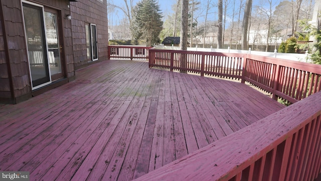 wooden deck featuring fence