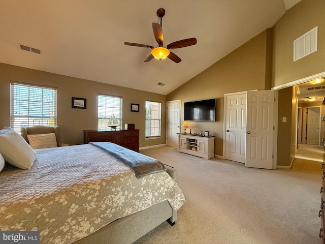 bedroom featuring visible vents, baseboards, light colored carpet, and high vaulted ceiling