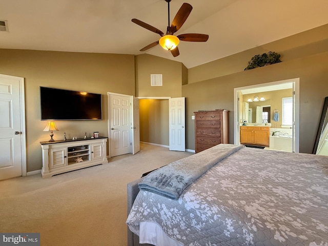 bedroom featuring visible vents, baseboards, ensuite bath, and carpet flooring