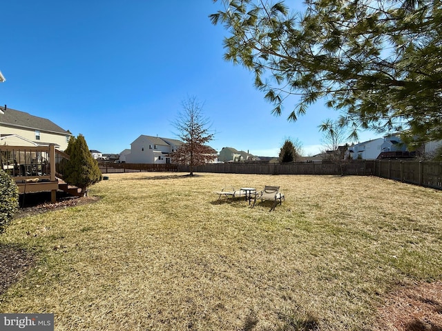 view of yard featuring a fenced backyard