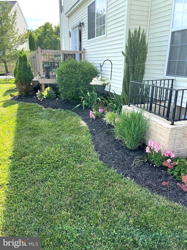 view of yard with a wooden deck