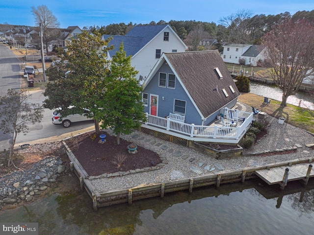 bird's eye view with a water view