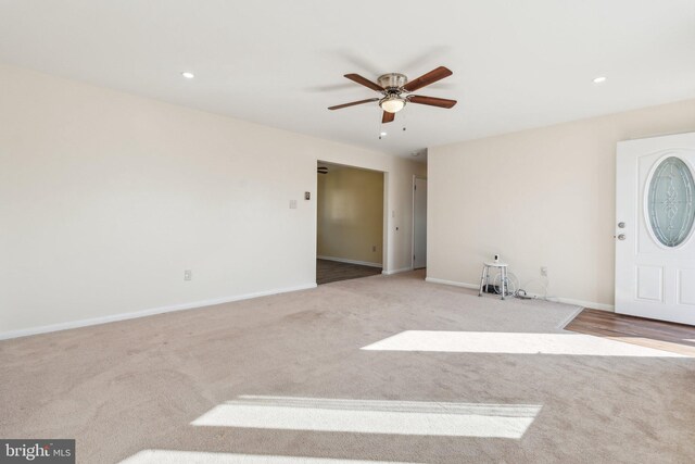 interior space featuring recessed lighting, baseboards, and ceiling fan