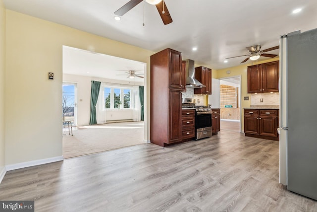 kitchen with tasteful backsplash, light wood-type flooring, stainless steel appliances, and wall chimney exhaust hood