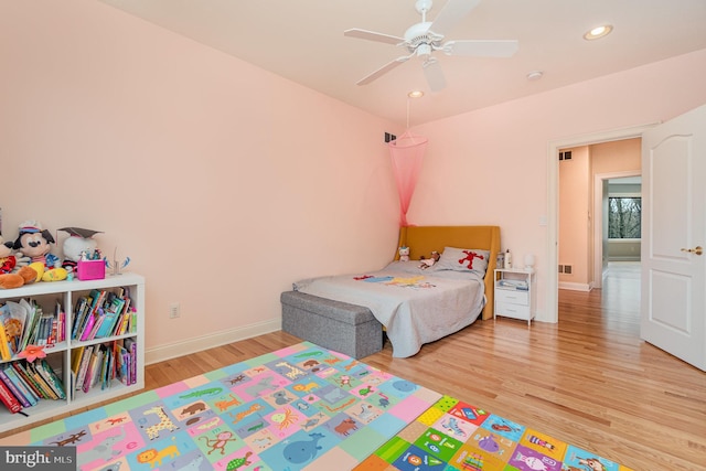 bedroom featuring visible vents, baseboards, ceiling fan, wood finished floors, and recessed lighting