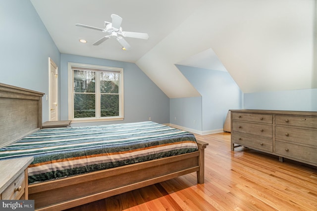 bedroom featuring recessed lighting, a ceiling fan, vaulted ceiling, light wood-type flooring, and baseboards