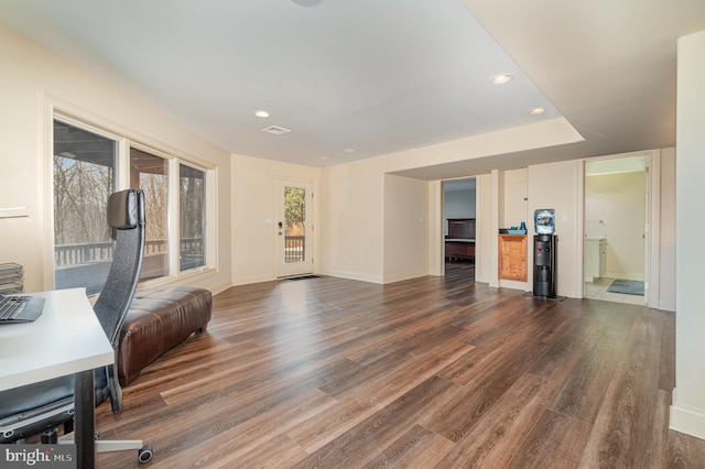 home office with recessed lighting, visible vents, baseboards, and wood finished floors