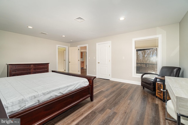 bedroom featuring dark wood-style floors, recessed lighting, visible vents, and baseboards