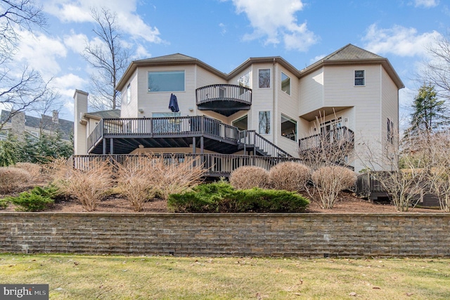 back of property with stairs