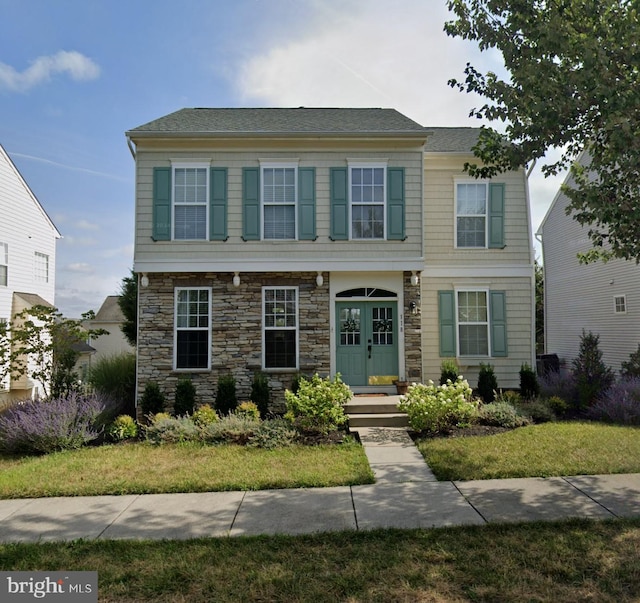 view of front of property featuring stone siding