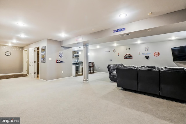 living area with light carpet, visible vents, recessed lighting, and baseboards