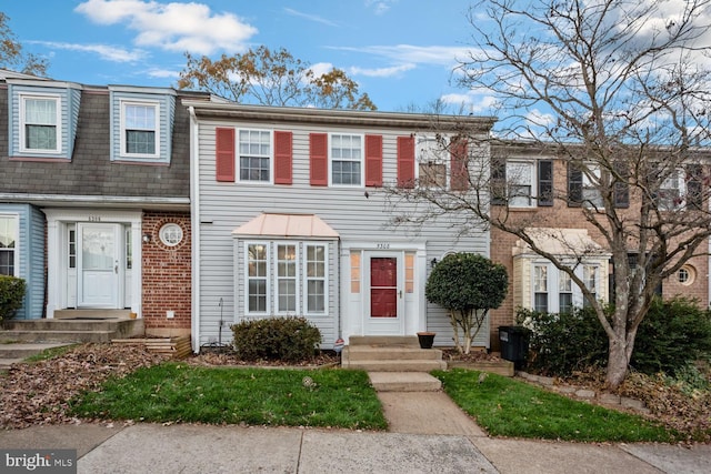 multi unit property with brick siding