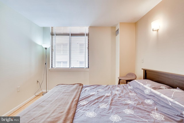 bedroom featuring baseboards