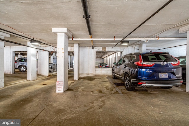 parking deck featuring a garage door opener