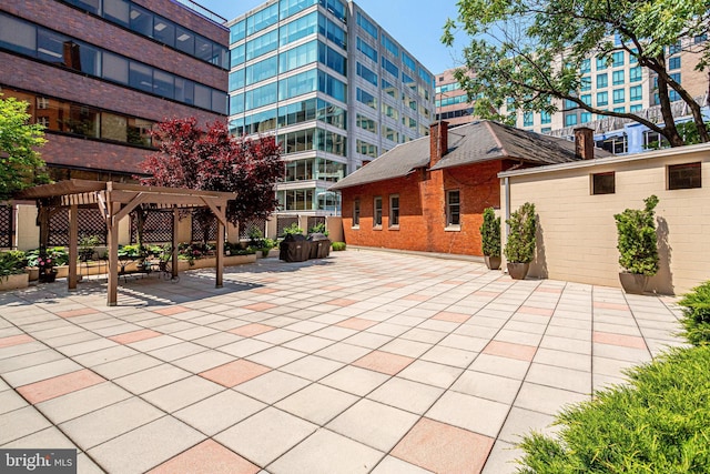 view of patio / terrace featuring a pergola