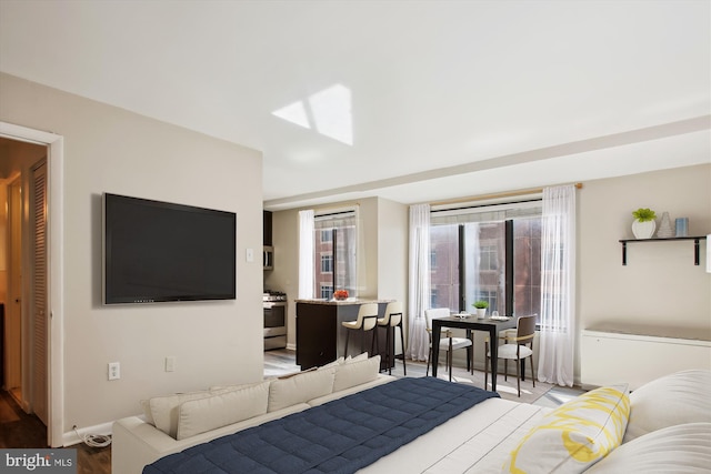 bedroom with wood finished floors