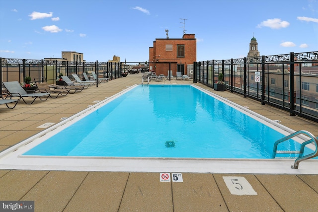 community pool featuring a patio