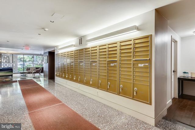 interior space featuring visible vents and mail area