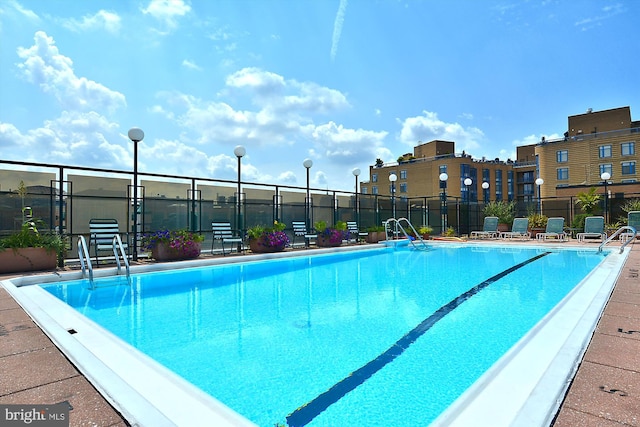 community pool with fence