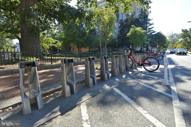 view of home's community with fence